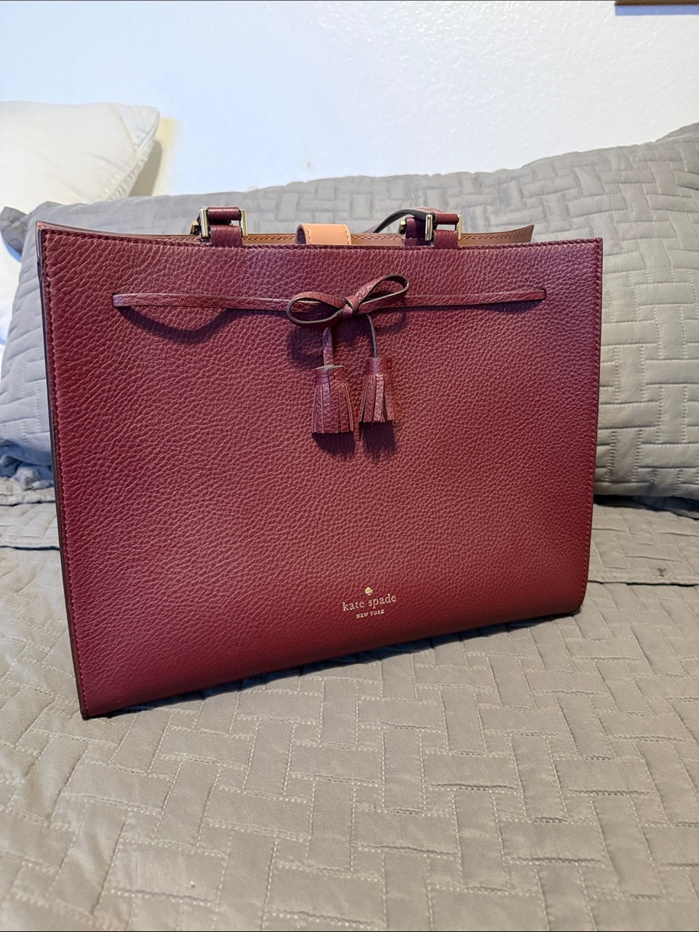 kate spade Burgundy Pebbled Leather Tote with Tassel Bow